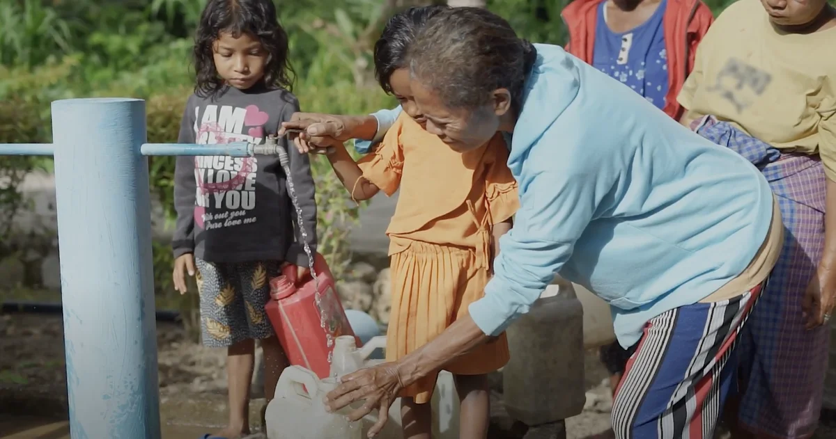 How do NGOs promote community development